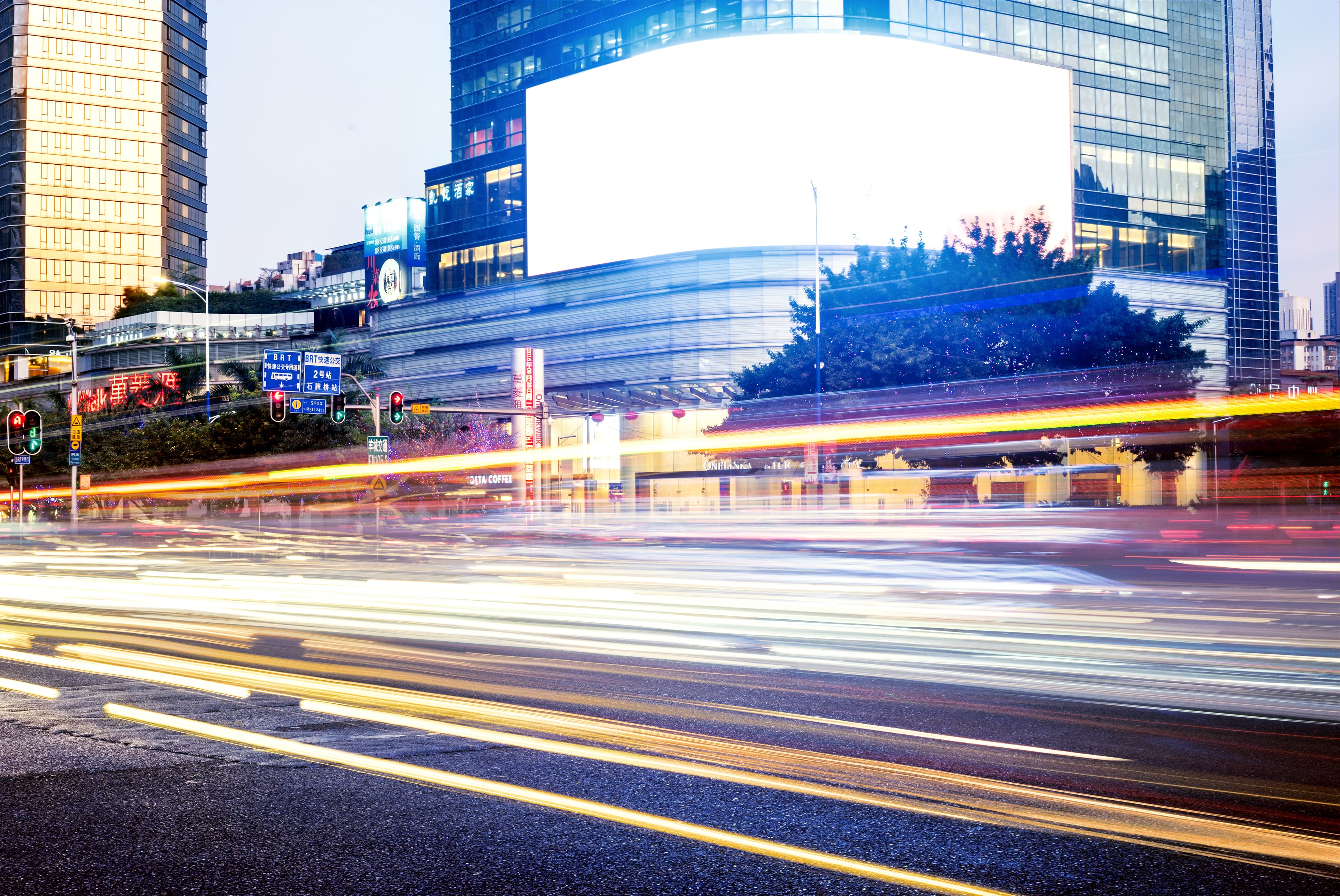 Long exposure highway at night — route-level mobility advertising